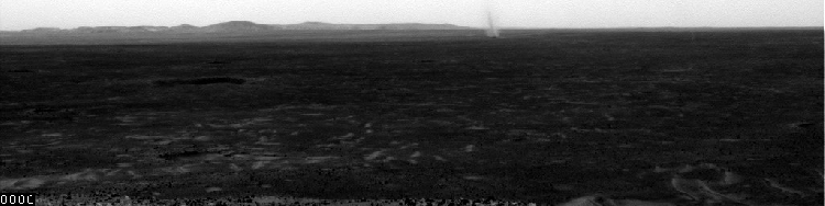 Several dust devils moving from right to left across a plain inside Mars’ Gusev Crater are seen by Spirit in hills rising from the plain. Taken during the rover’s 543rd Martian day, or sol (July 13, 2005), the images in this clip have not been processed to enhance contrast of the dust devils. The total time elapsed during the taking of these frames was 12 minutes, 17 seconds. Spirit began seeing dust devil activity around the beginning of Mars’ spring season. Activity increased as spring continued, but fell off again for about two weeks during a dust storm. As the dust storm faded away, dust devil activity came back. In the mid-afternoons as the summer solstice approached, dust devils were a very common occurrence on the floor of Gusev Crater. The early-spring dust devils tended to move southwest-to-northeast, across the dust devil streaks in Gusev seen from orbit. Increasingly as the season progresses, the dust devils are seen moving northwest-to-southeast, in the same direction as the streaks. Scientists used Spirit to watch for the big dust devils that leave those streaks.
