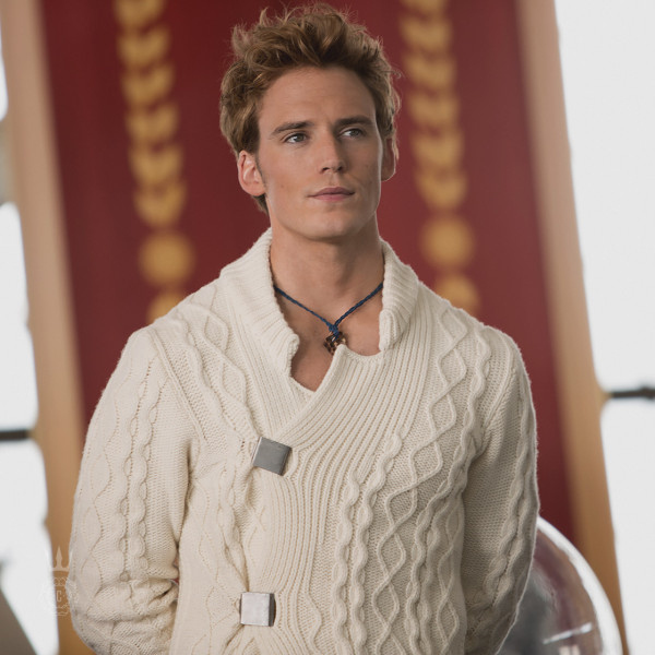 Finnick looked poised and handsome at his Reaping, and that sweater looked insanely comfy. We wouldn't mind cuddling in that thing!