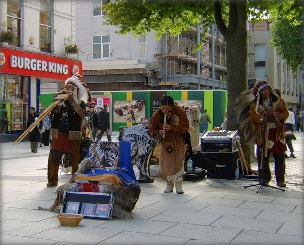 I'm not sure why or how every city square in the world is a performance space for a group individuals dressed as North American Indians playing South American instruments to a backing CD in a sort of pseudo-karaoke style. I wonder how many requests they get to play happy birthday.