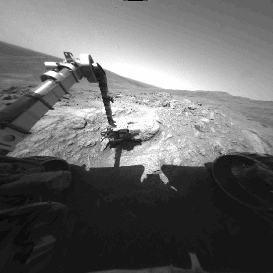 Spirit moved its robotic arm, called the instrument deployment device, to take a series of images with the rover’s microscopic imager during the rover’s 469th Martian day, or sol (April 28, 2005). The arm’s carefully planned motions positioned the microscopic imager to take an array of 24 images of this rock target, dubbed “Keystone,” at an outcrop called “Methuselah.” The microscopic imager frames were combined into a mosaic view showing the finely laminated texture of the rock, seen below: