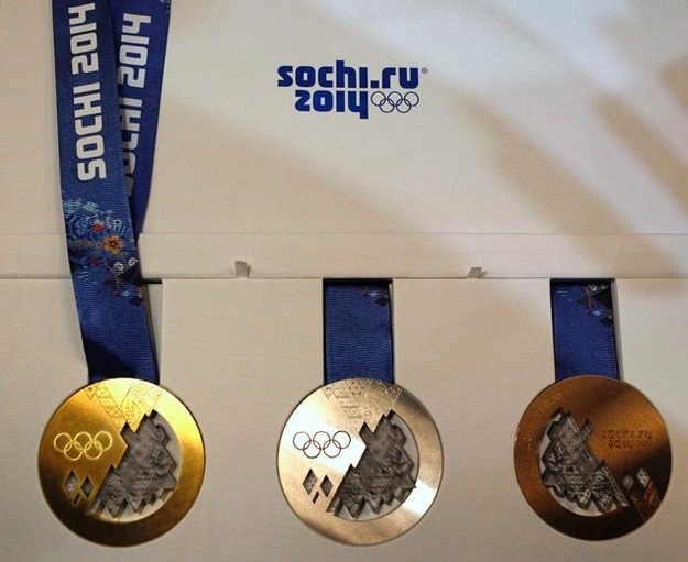 A record 1,300 medals, 0.4 inches thick + 4 inches in diameter, are being manufactured for the Olympics and Paralympics. The medals depict the sun’s rays reflecting through a prism of snowy mountains and sandy beaches.
