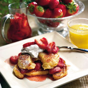 Sweeten up this flaky French treat with fresh strawberries, whipped cream and strawberry syrup.