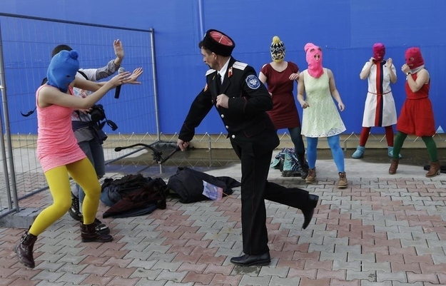 Watch Pussy Riot Get Whipped By Cossacks In Sochi