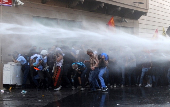 Terrifying Pictures Of Police Hitting Turkish Protestors With Water