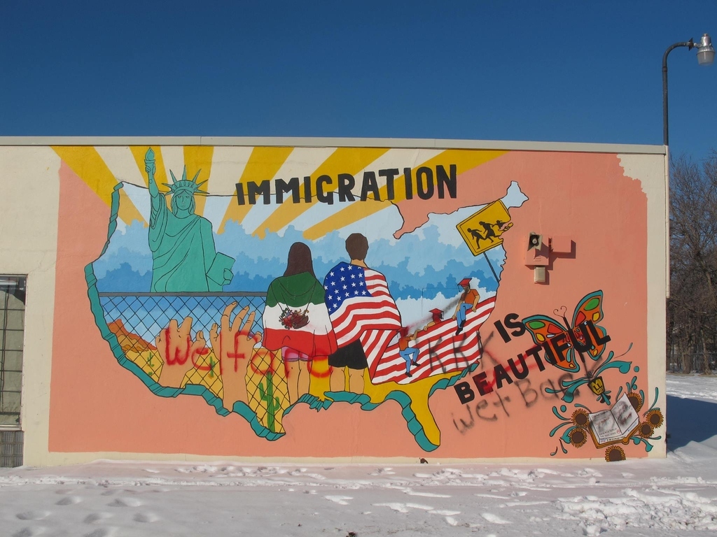 "Immigration Is Beautiful" Mural Defaced With Racist Graffiti In Kansas