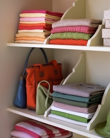 Or use a handy handbag organizer., 53 Seriously Life-Changing Clothing Organization  Tips