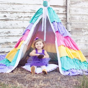Making a homemade tent like this ruffled teepee is just one DIY way for little ones to enjoy the outdoors. Plus, sun protection has never looked quite this fabulous.