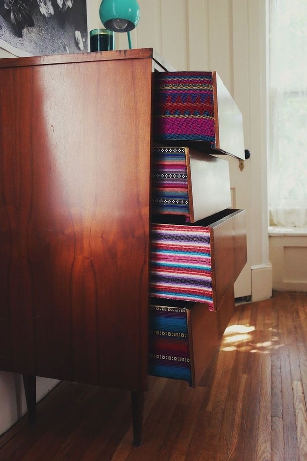 Add fabric to the sides of the drawers