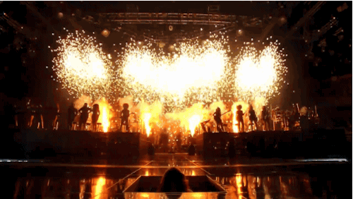 Lights. Fireworks. Drums. Blackout. Spotlight. Queen.