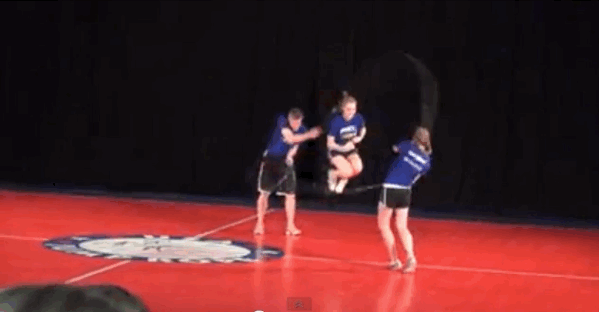 A Double Dutch freestyle routine using three jumpers.