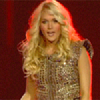 The ultimate diva hair flip! It's a go-to for any experienced artist's stage performance.