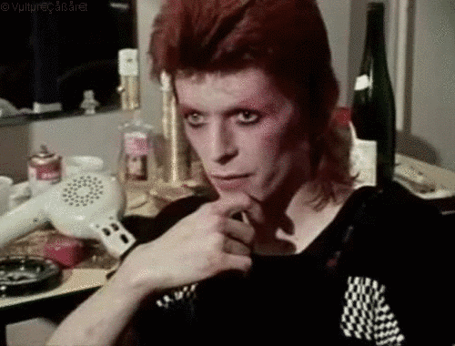 As Mr. Stardust shows us here, never get ready to go outside without a bottle of wine or champagne to ease your nerves. Looking so good can be stressful and requires proper self-medication.