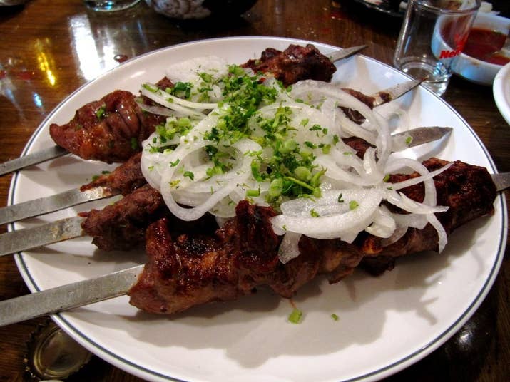 Chunks of lamb, chicken, or lyulya (a mix of mutton and spices) served on steel skewers and topped with more slices of raw onion than you ever thought you'd encounter. It's often served with Adjika- a bright red, spicy sauce made from hot red peppers.