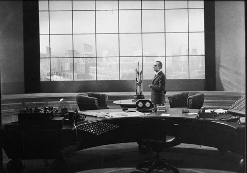 One of the earliest executive offices on film is also one of the most strikingly imagined.