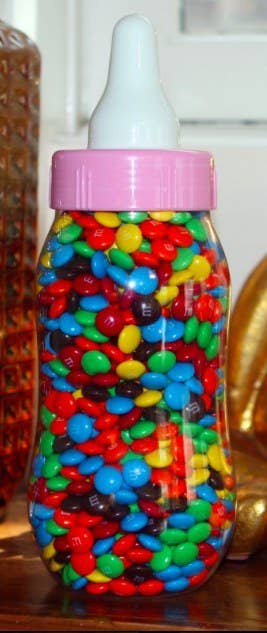 Fill a giant bottle with candies, and have guests guess how many there are. Whoever comes closest takes the treats home.