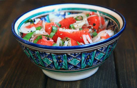Uzbek cuisine doesn't offer much for the diehard vegetarian, but this dish made up of thinly sliced tomatoes and onions seasoned with spices offers a light, healthy, but still flavorful option.