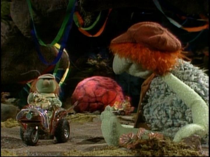 This veiny, eyeless horror rolls into Fraggle Rock and starts swallowing Doozers without provocation and without mercy. Thankfully, after telling it several jokes, it laughs so hard the victims are regurgitated to safety.