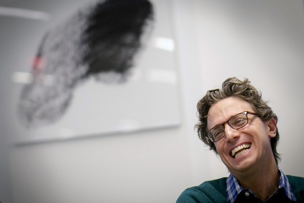 BuzzFeed's Founder and CEO Jonah Peretti reacts during an interview at the company's headquarters in New York January 9, 2014.