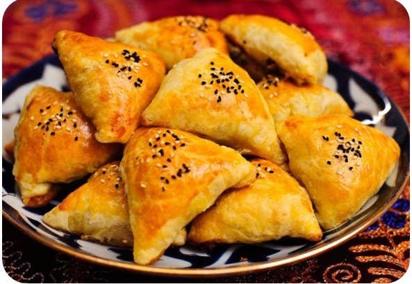 A triangular dough pastry that's baked in a tandoor oven so that the bread is somehow both crunchy and super-soft. Like manty, they can be filled with a variety of things, including ground lamb, herbs, and, the most interesting traditional option, pumpkin.