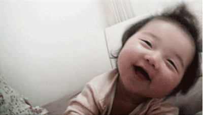 Sure, it might not mean anything until we're a little bit older, but babies start smiling in the womb.