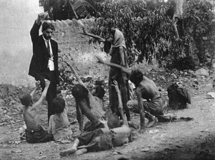 They kidnapped children, converted them to Islam and adopted them out to Turkish families. The photo shows an alleged Turkish official teasing Armenian children with food.