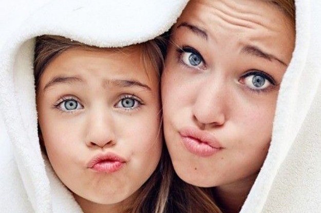 Mother and Daughter Posing Together in Studio · Free Stock Photo