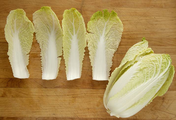 Choose four large cabbage leaves from the outside of the head of cabbage. Wrap the remaining cabbage in plastic wrap and store it in the fridge.
