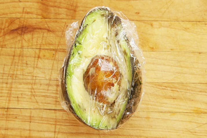 To store the remaining 3/4 avocado, keep the pit intact and the skin on, and wrap it tightly in plastic wrap. Store in the fridge.