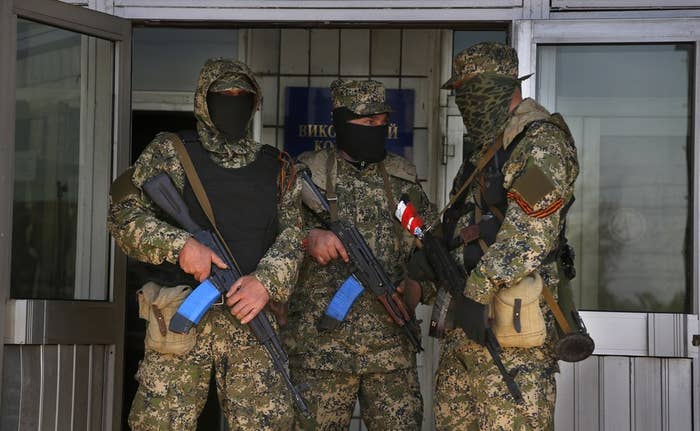 Pro-Russian armed men south of Slovyansk, eastern Ukraine.
