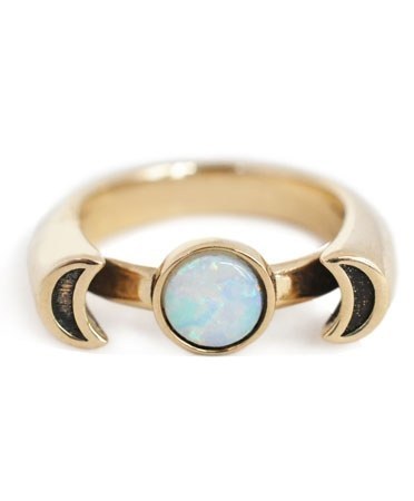 This brass ring with opal stone.