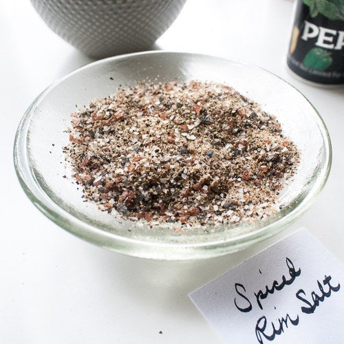Make a spiced salt for the rim by adding ground peppercorns, Old Bay, ground celery seed, and other seasonings to kosher salt.