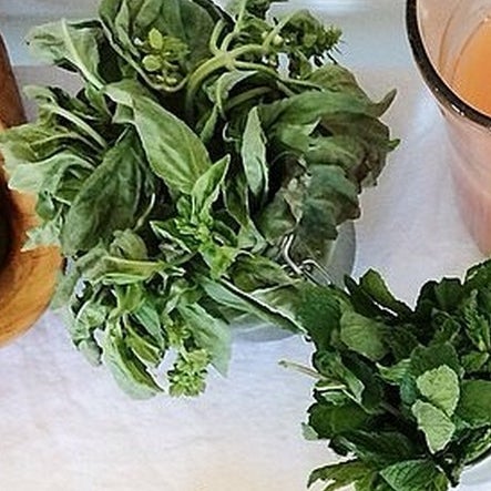 Set out cleaned and dried fresh herbs like mint, rosemary, basil, thyme and tarragon.