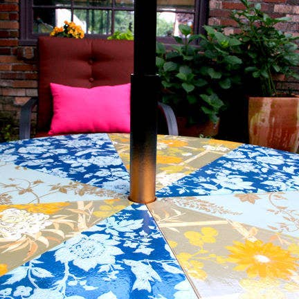 Give an old umbrella table some love with this cool patterned re-cover idea. Get the directions here.