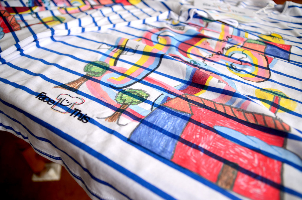 This newly and uniquely created artwork screamed for being printed on T-shirts. And so this happened...