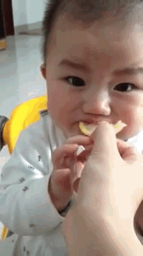 You Absolutely Must Watch This Adorable Baby Try A Lemon For The First Time