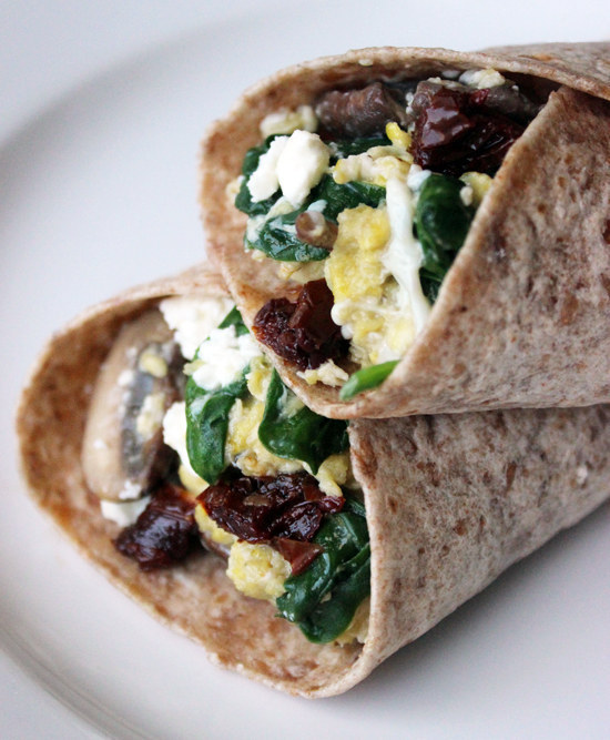 Scramble eggs with spinach and feta then wrap in a whole grain tortilla.