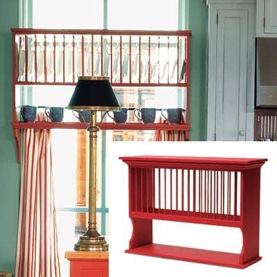 And, while you're at it, play with the placement of your plate rack, too! This one is creatively mounted in a window.To match the custom piece at left, we coated this pine unit in a fiery red (which also brightens the island). -J.D.F.See the rest of this kitchen and get the look!