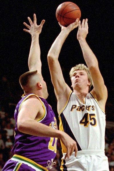 With almost 13,000 career points and phenomenal offensive stats, Rik Smits played alongside other Pacers greats like Reggie Miller and Detlef Schrempf. He is one of the tallest NBA players of all time, towering at 7'4". He played for the Pacers from 1988 to 2000, sticking with them throughout his whole professional career.