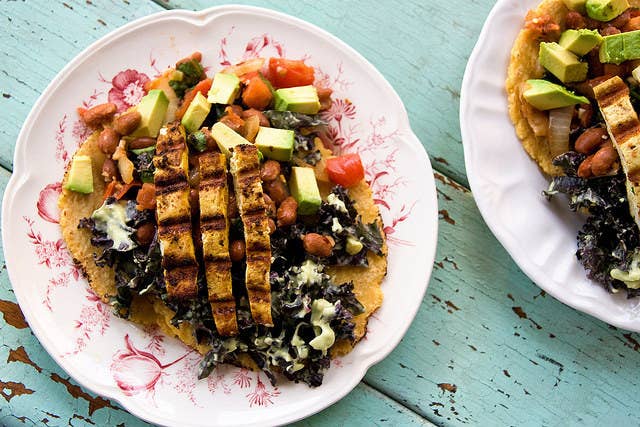 Tofu, pinto beans, kale, corn tortillas and avocado all add up to more than 9g/protein per taco. Two make a good meal but three will make an even better one. Recipe here.
