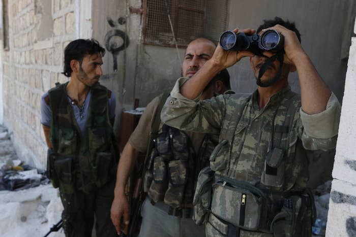 Rebel fighters in Aleppo