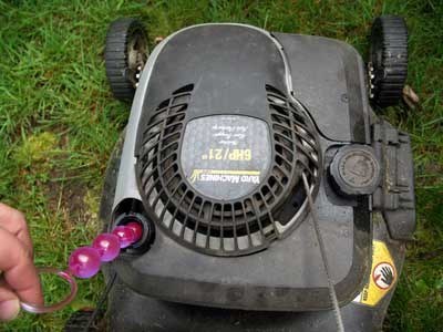 Got a set of old anal beads lying around? Use them to check the oil levels of your lawn mower to start mowing to your full potential!