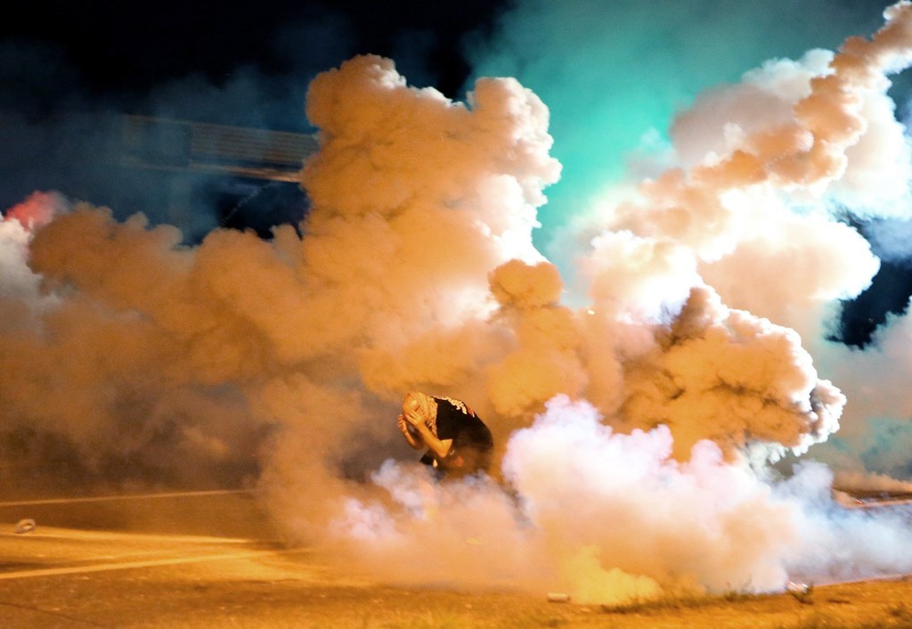 A protester engulfed in smoke Wednesday.