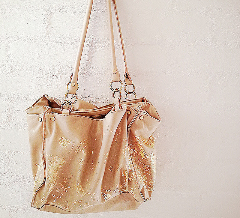 Say goodbye to that dingy leather bag! A few strategically placed gold foil splashes give your tote a fresh new look.