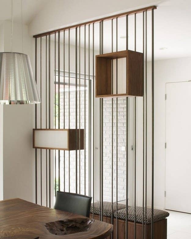 These industrial metal rods give the illusion of a wall.