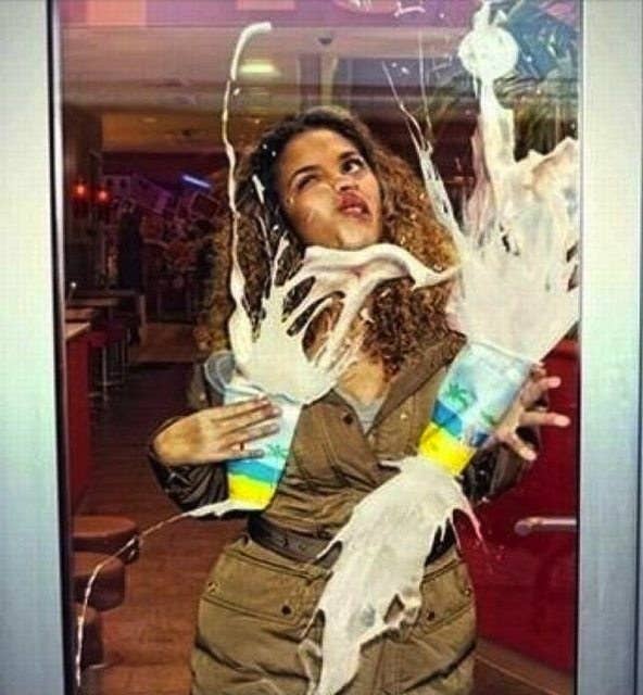 Holding the door open for you.