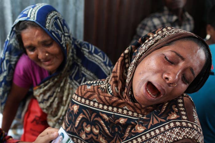 A Bangladeshi woman cries for her missing mother following the capsize.