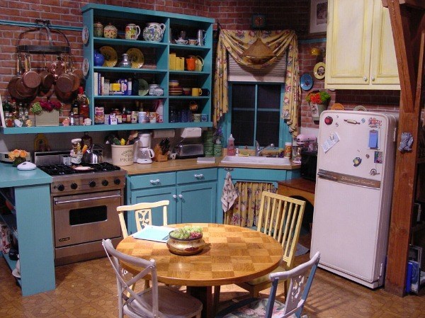 If you look at any kitchen redos in magazines everyone seems to be ripping off their kitchen cabinet doors and going for a more open, free-flowing feel. Plus, it's really easy to get to all your stuff! (Monica-level organization is required to pull off this look)