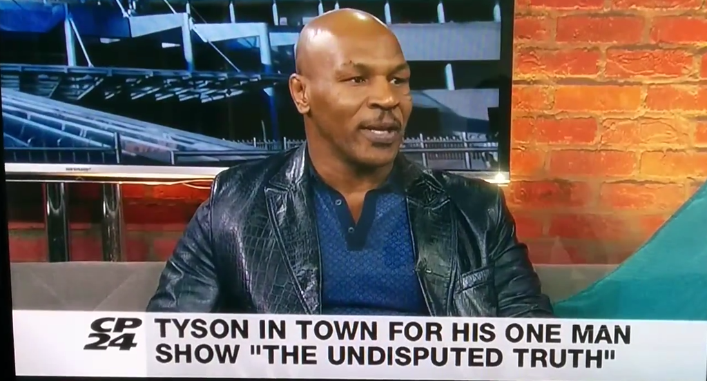 Mike Tyson flips out when news anchor suggests rape conviction