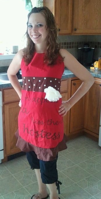 Quick! Someone quiz this girl on her Seahawks trivia!(Our guess is she just wants more money for her SWEET apron collection.)