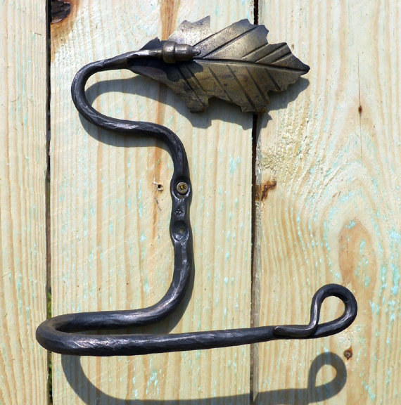 In case you needed a reminder, this toilet paper holder makes sure you never leaf the room without cleaning yourself up first.